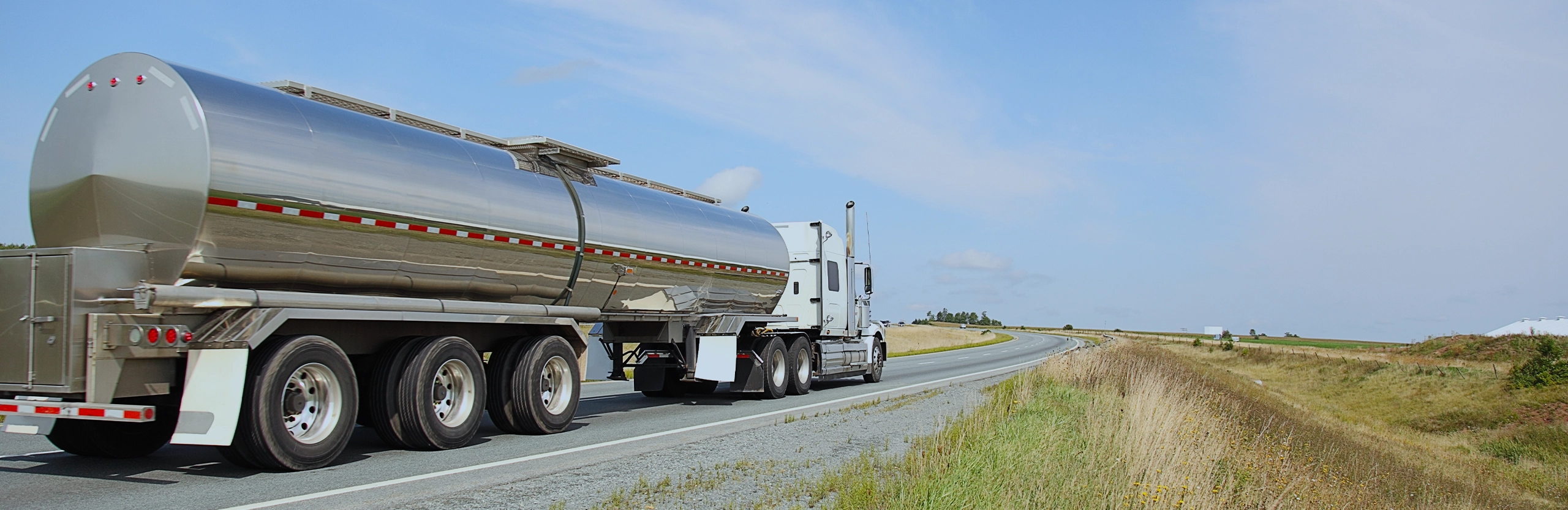 DSN Chemical Transportation carrier partner driving double tanker carrying liquid chemicals on North American highway