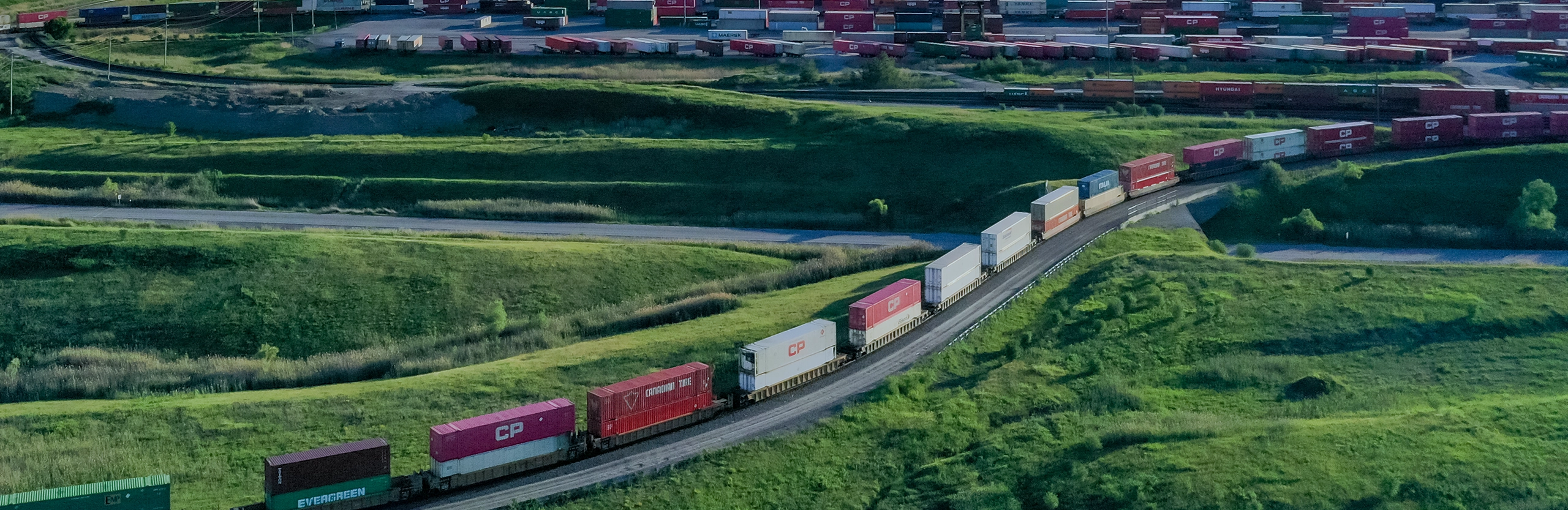 CP Rail train leaving container yard in North America