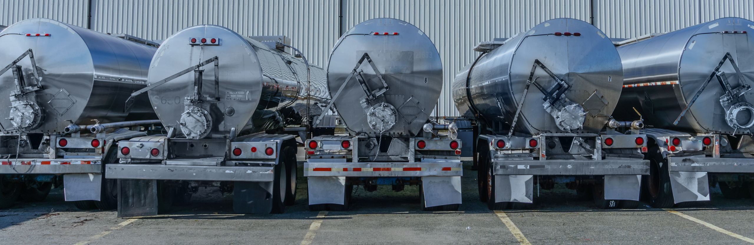 Tanker trailers parked at DSN Chemical Transportation carrier partner terminal in North America